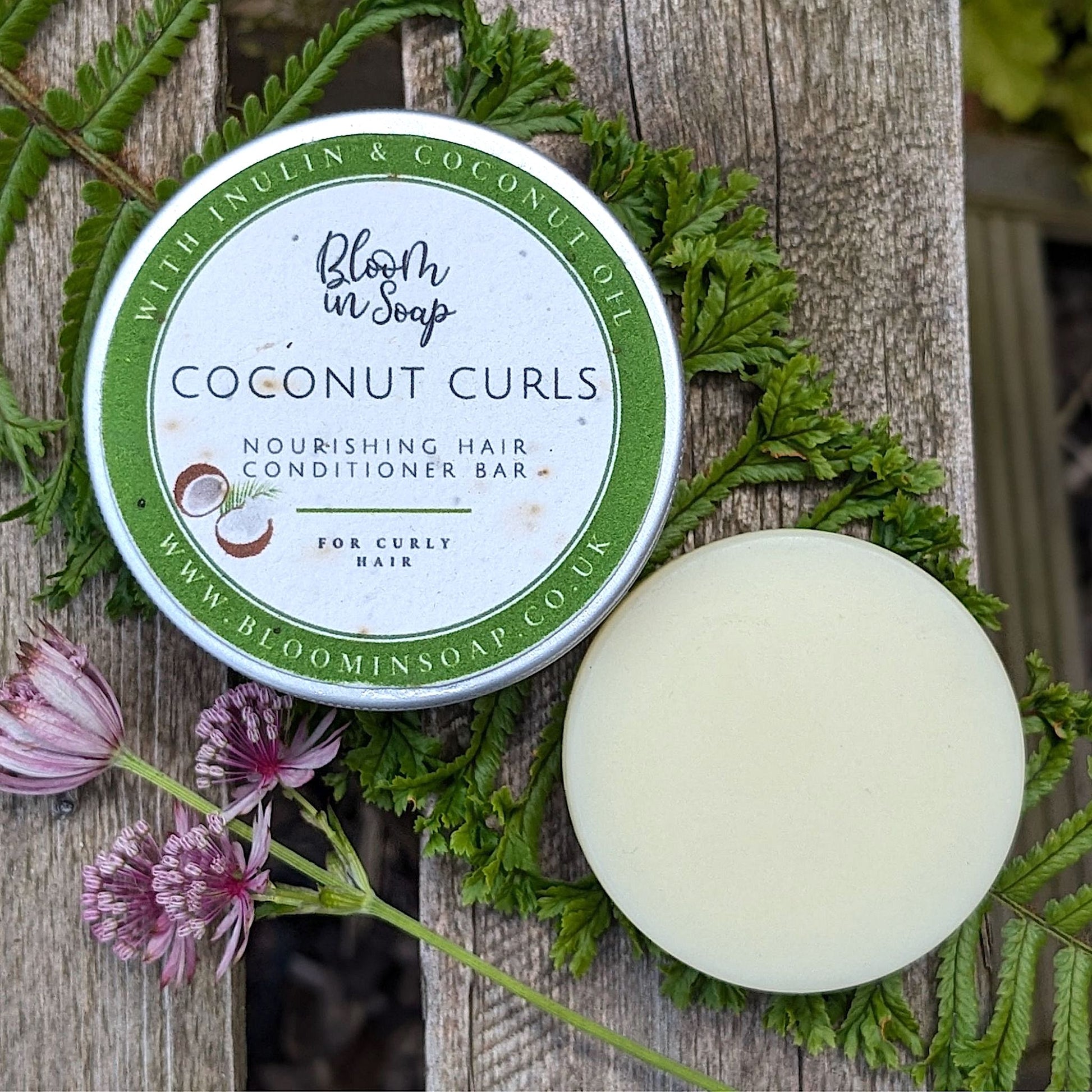 Coconut Curls conditioner bar in a tin